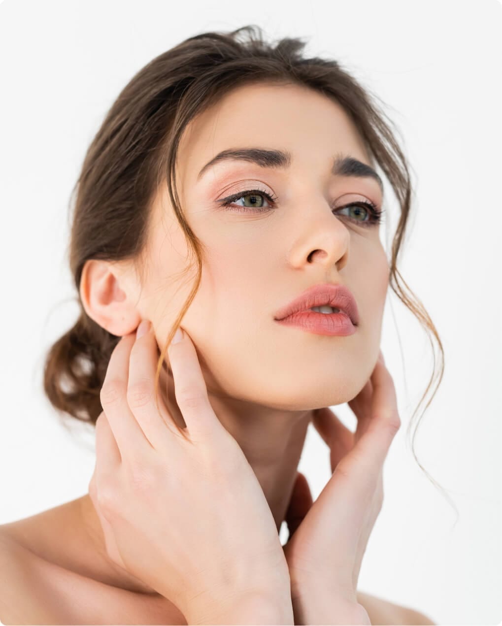 Woman with smooth, refreshed appearance after facelift procedure
